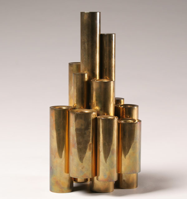 Machine Age brass candle holder in the style of Gio