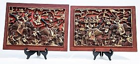 PAIR OF CHINESE PAINTED AND CARVED WOOD PANELS20th Century Depicting