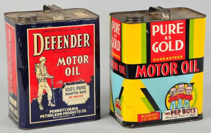 Pure as Gold Defender Motor Oil Cans Both are two