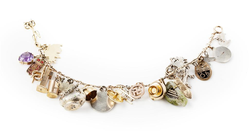 A multi gem set charm bracelet the bracelet composed of