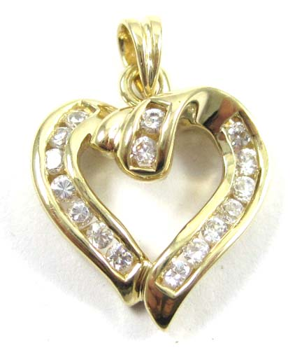 DIAMOND AND TEN KARAT GOLD PENDANT The yellow gold open