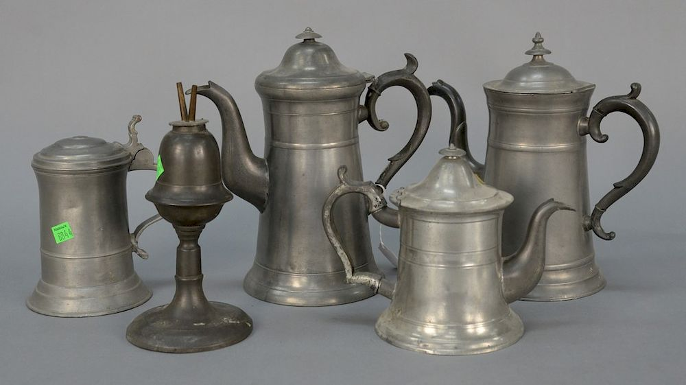 Four piece pewter lot to include three teapots one marked