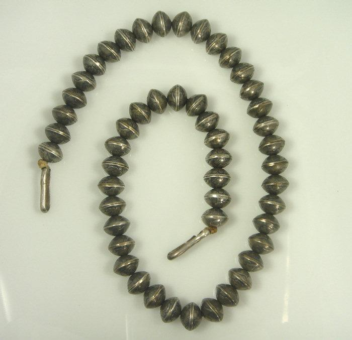 Unusual beaded silver necklace each bead is made of 2