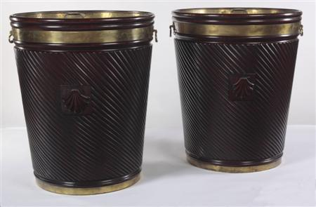 A pair of massive Irish mahogany and brass bound peat
