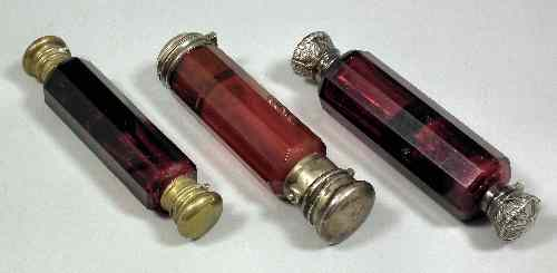 A Victorian silvery gilt metal mounted cranberry glass double ended