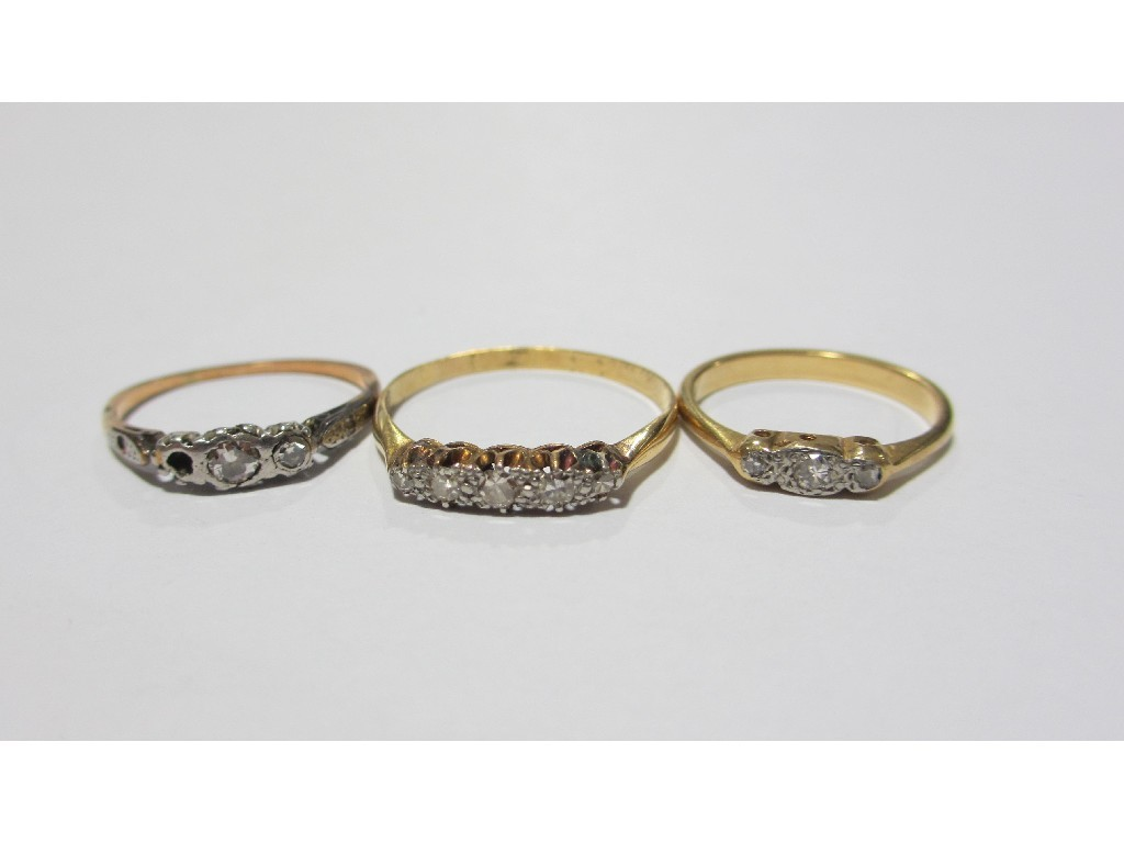 Three 18 ct gold diamond set rings