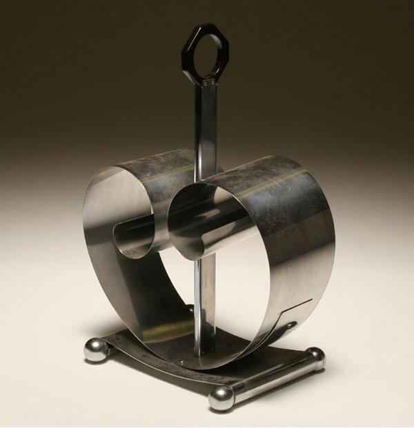 Revere Art Deco chrome scroll magazine rack with bakelite handle