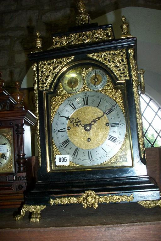 A 19th century ebonised bracket clock in a Georgian style