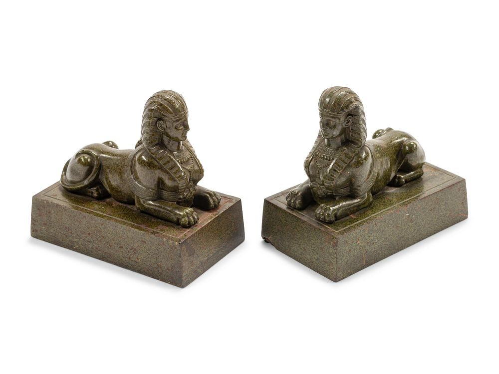 A Pair of Continental Patinated Metal Sphinxes A Pair of