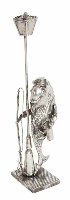 A nickel silver model of an inebriated comical fish stamped