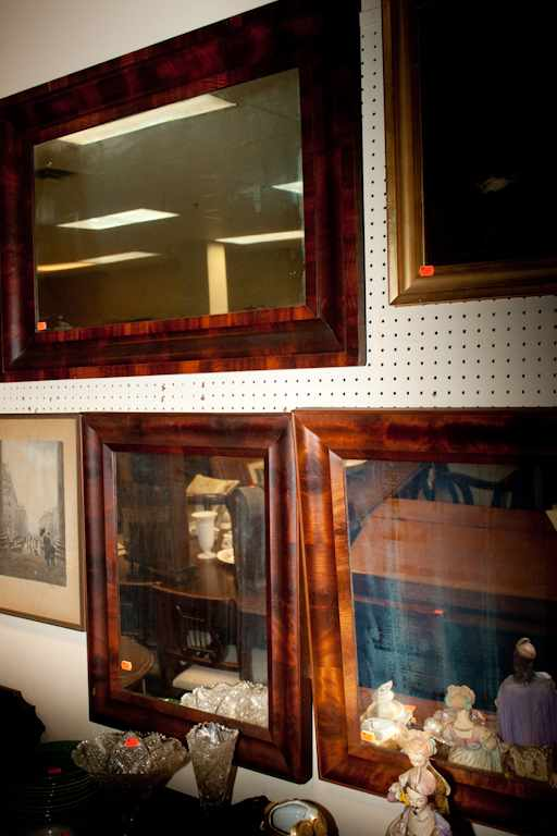 Three American Empire mahogany ogee mirrors Estimate 40 60 All