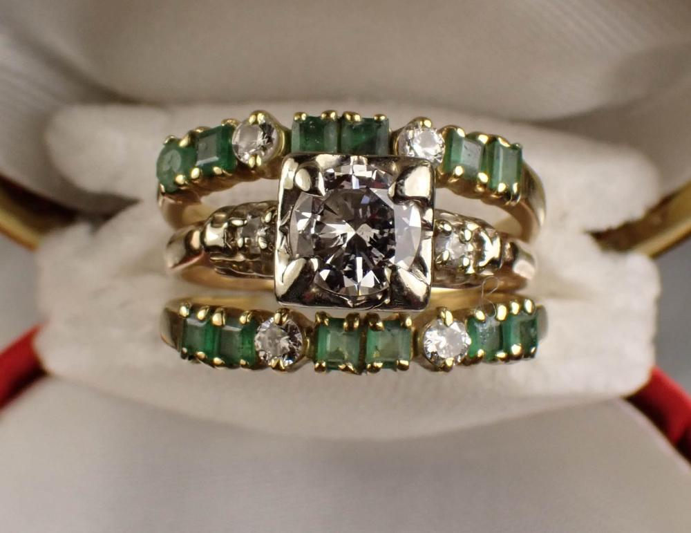 DIAMOND EMERALD AND FOURTEEN KARAT GOLD RING made up of