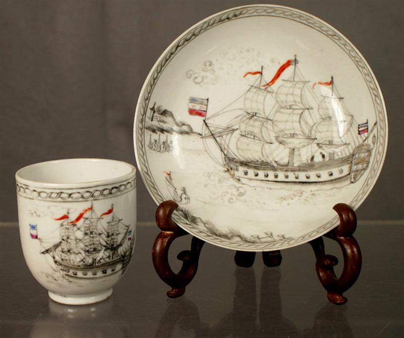 Chinese Export porcelain handled cup with saucer with polychrome enameled