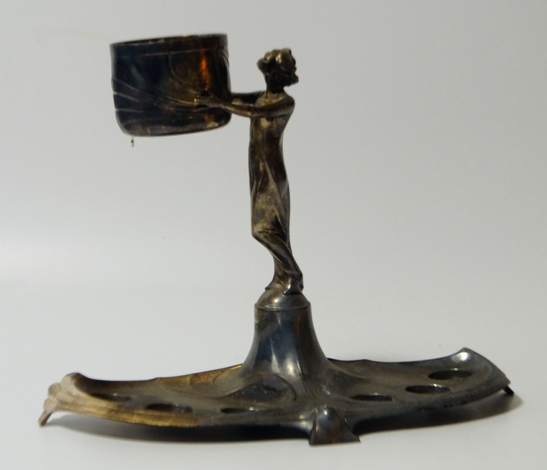 A WMF electroplated table stand with figural stem supporting a