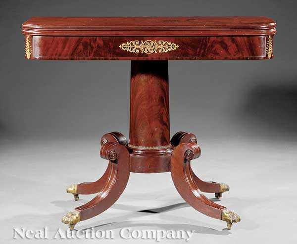 An American Classical Brass Mounted Carved Mahogany Games Table early