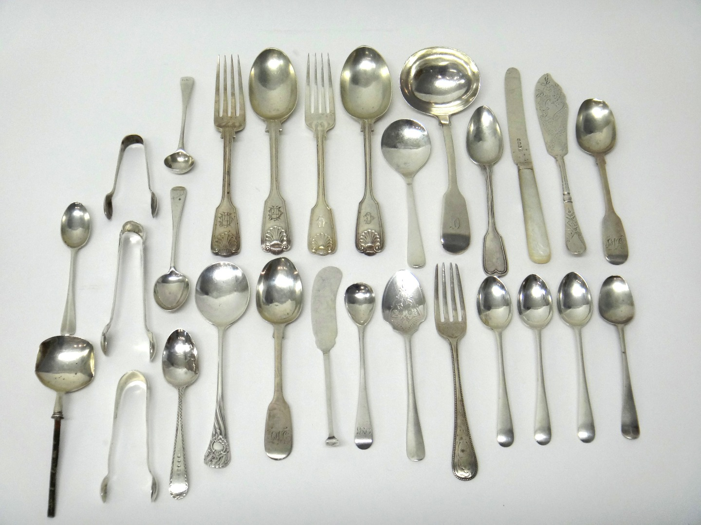 Silver table flatware comprising a Victorian fiddle pattern sauce ladle