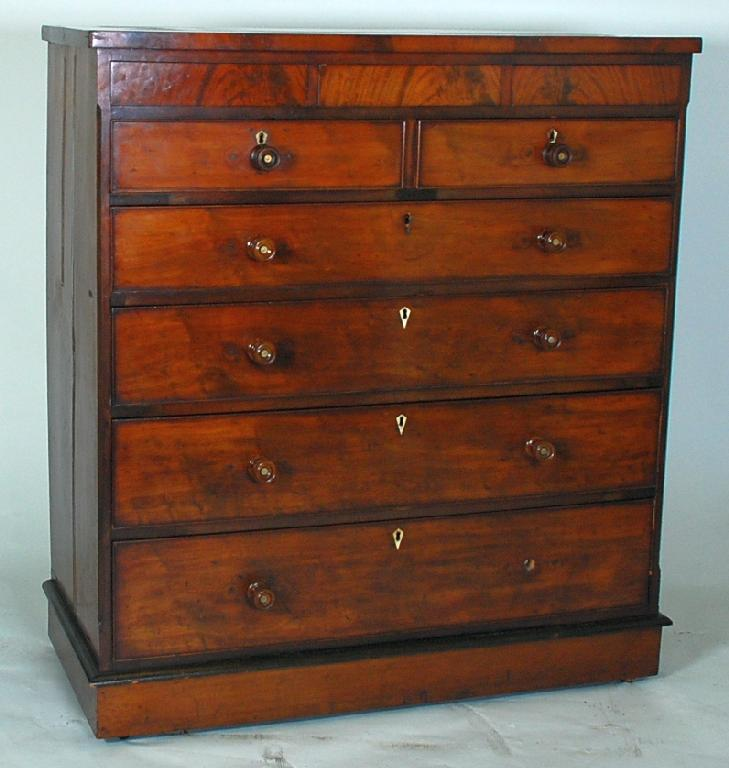 VICTORIAN MAHOGANY CHEST OF DRAWERS the oblong top above three