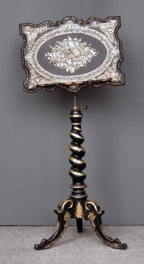 A Victorian black papier mache rectangular adjustable reading or music