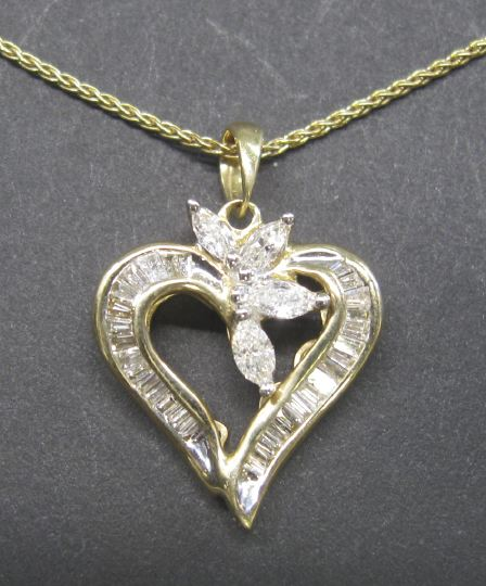 Fourteen Karat Yellow Gold and Diamond Heart Shaped Pendant and