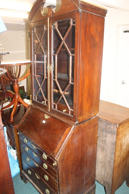 A MAHOGANY BUREAU BOOKCASE the upper section enclosed by two