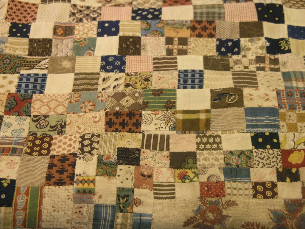 A Victorian patchwork quilt signed Mary Ann Piper 18 numerous