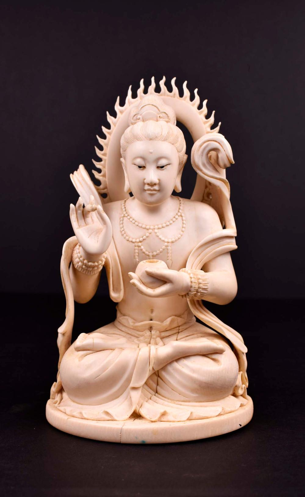 FINE CHINESE CARVED SEATED BODHISATTVALate Ching Dynasty The underside with