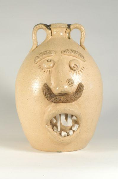 Signed D B Garner 1991 Salt glazed stoneware double face