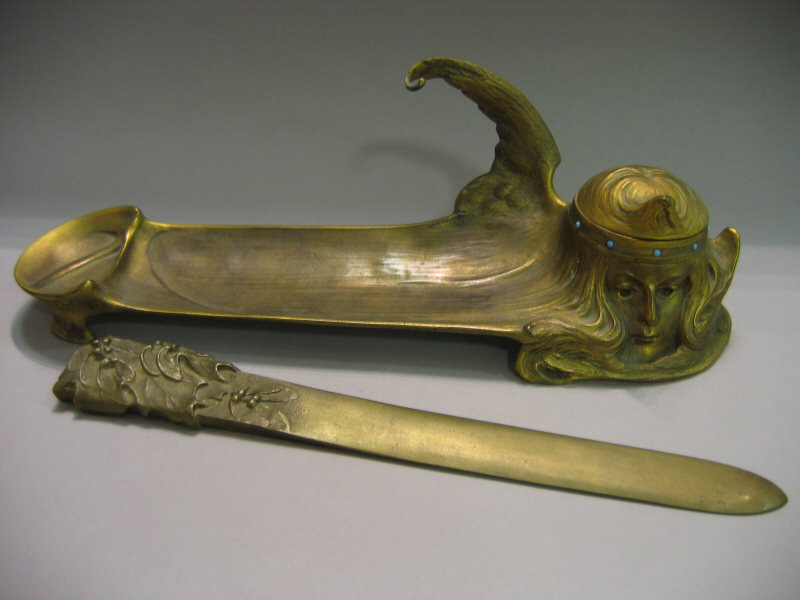 TWO ART NOUVEAU DESK ITEMS including a gilt metal figural