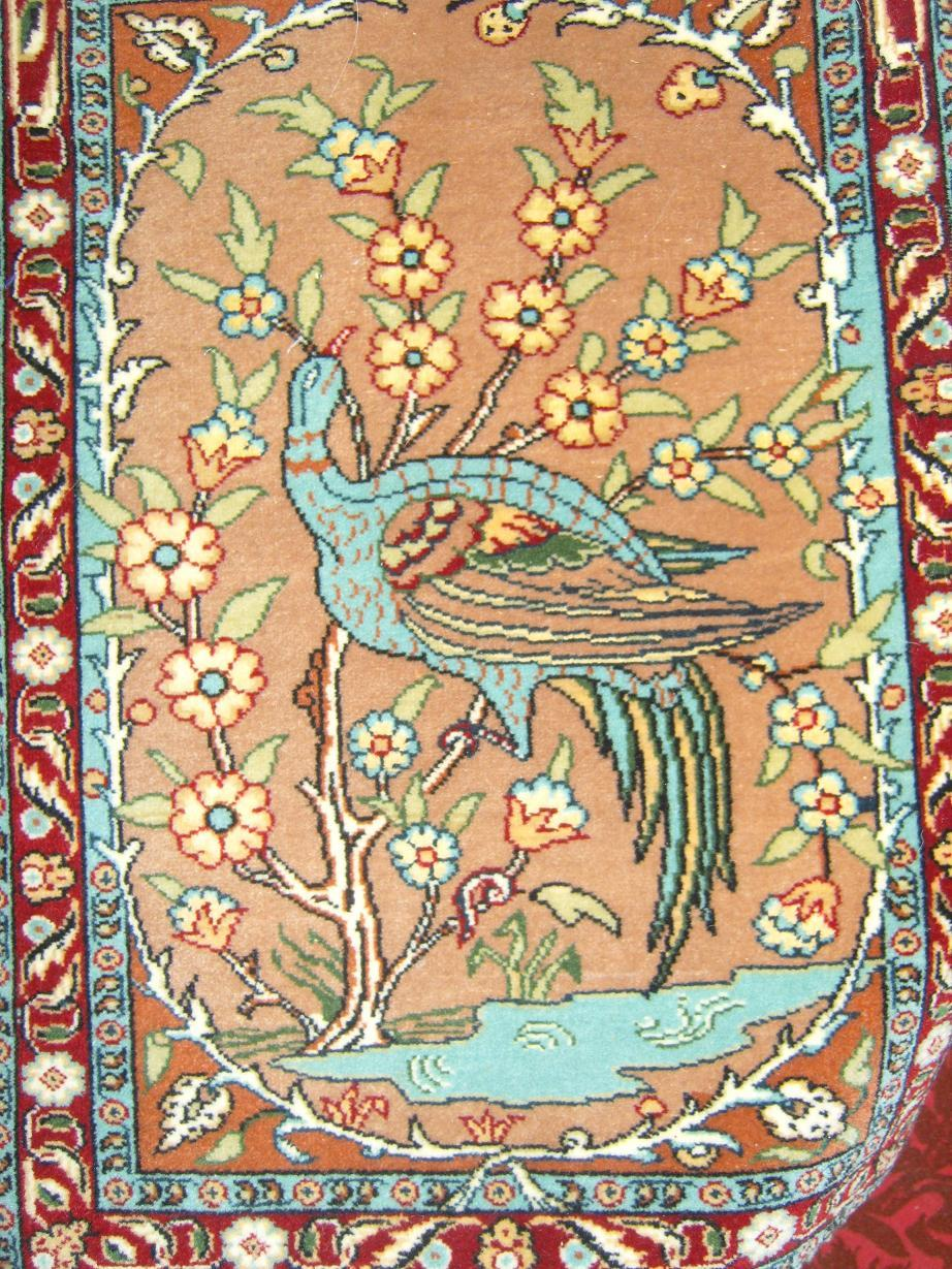A basket containing a collection of ethnic textiles including woven