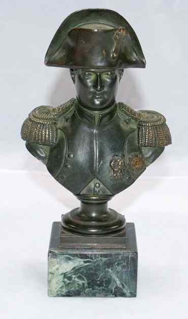 A BRONZE BUST of the head and shoulders of Napoleon
