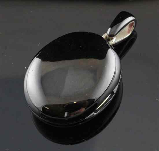 A jet oval pendant locket overall 2in Estimate 150 250