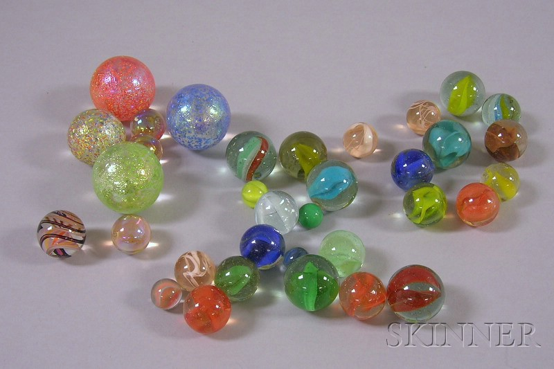 Thirty four Cat s eye and Studio Glass Marbles approx