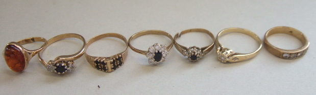 A 9ct gold and diamond set single stone ring with