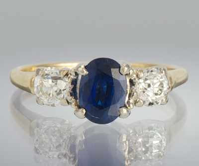 A Ladies Blue Sapphire and Diamond Ring 14k white gold