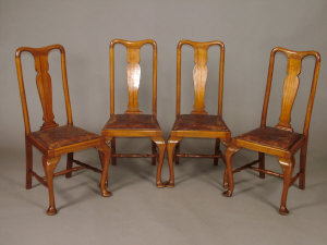 A set of four mahogany Queen Anne style dining chairs