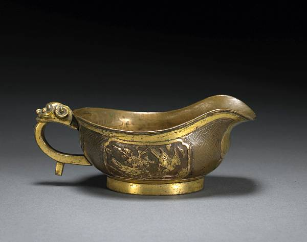 A parcel gilt miniature cup 17th Century Of low ovoid