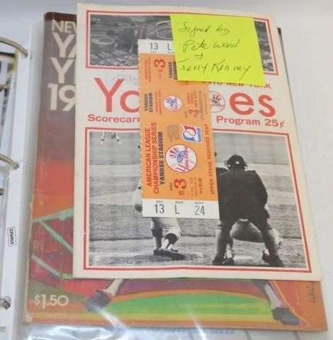 BINDER CONTAINING 14 PCS OF EPHEMERA TO INCLUDEYANKEES YEARBOOKS FROM
