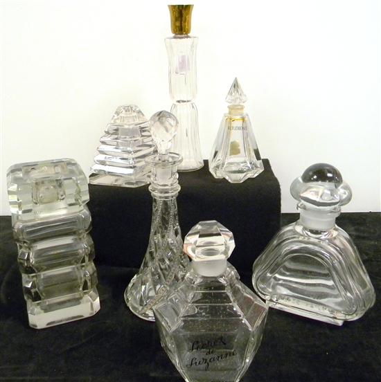 Commerical perfume bottles including 7 large bottles includes a Secret
