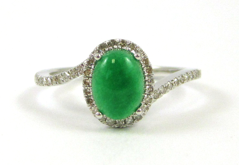 JADE DIAMOND AND FOURTEEN KARAT GOLD RING The white gold