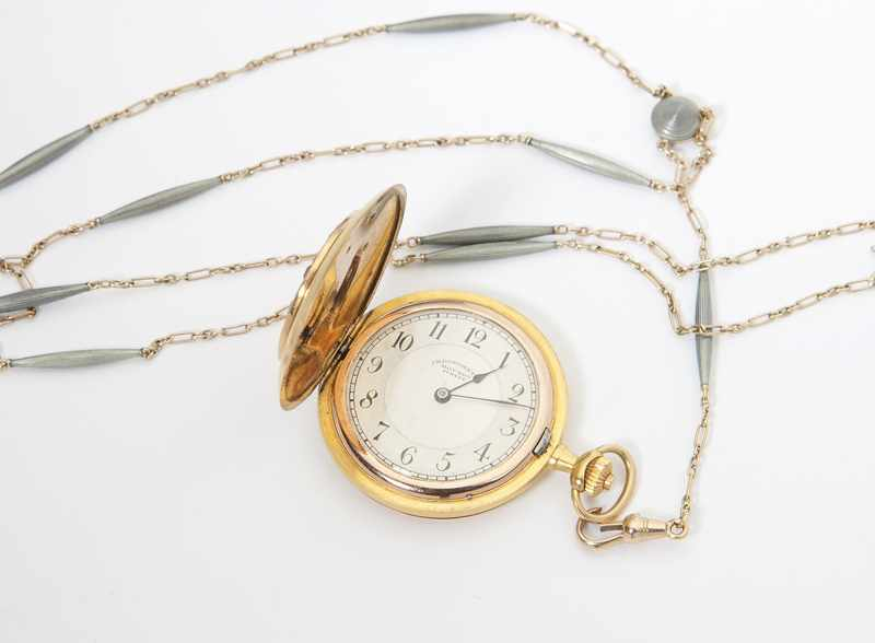 A lady s hunter case pocket watch and fob The