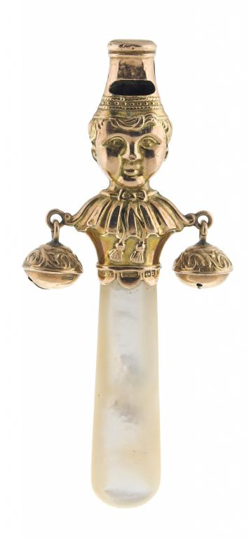 A VICTORIAN 9CT GOLD BABY S RATTLE embossed as the