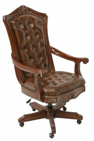 Executive swivel desk chair late 20th c having foliate carved