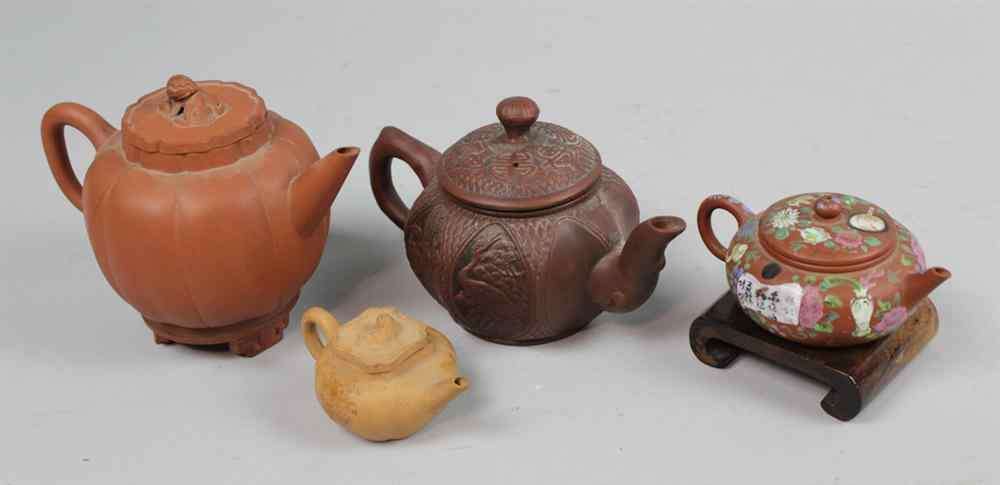 FOUR SMALL CHINESE YIXING TEAPOTS QING DYNASTY AND LATER including