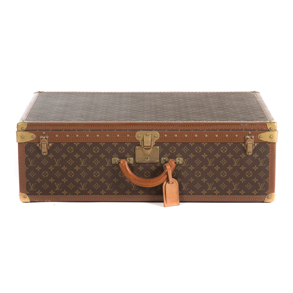A Louis Vuitton Monogram Canvas Suitcase Circa 1920 serial 985051