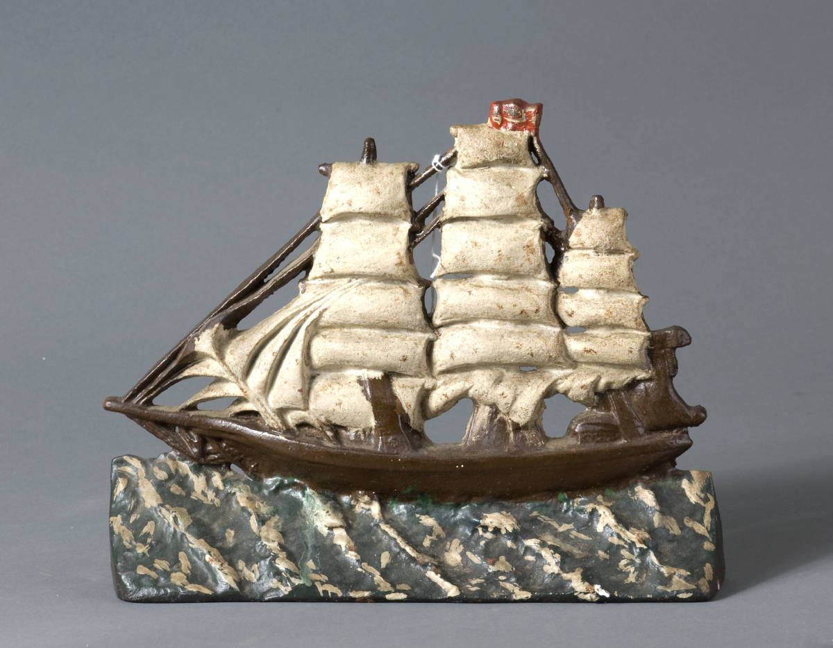 CAST IRON AND POLYCHROME PAINTED SCHOONER SHIP DOORSTOP Marked on