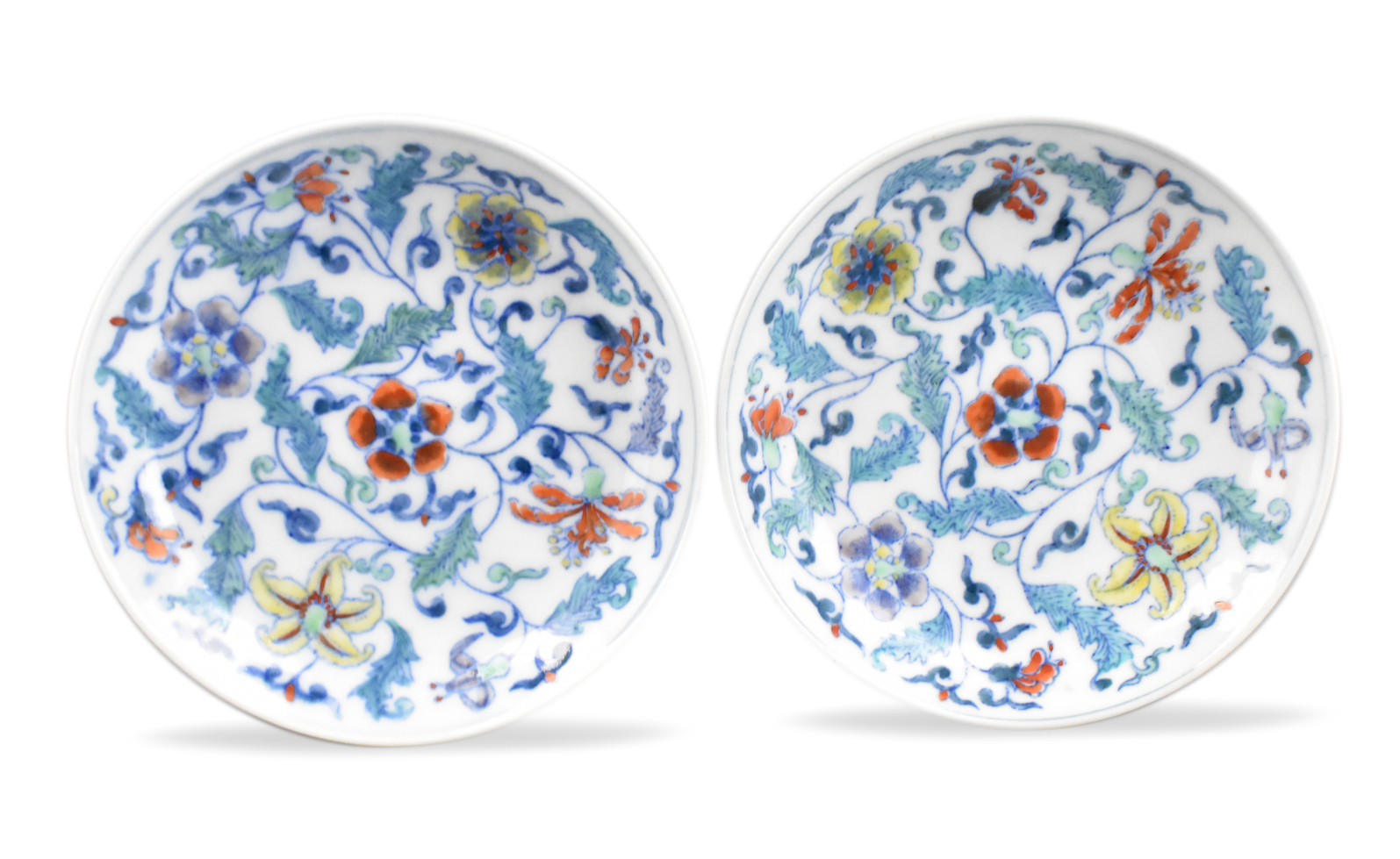 A pair of Chinese doucai scrolling floral plates Two plates