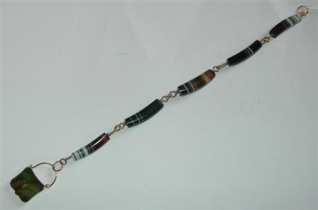A 9ct gold mounted Scottish pebble set bracelet composed of
