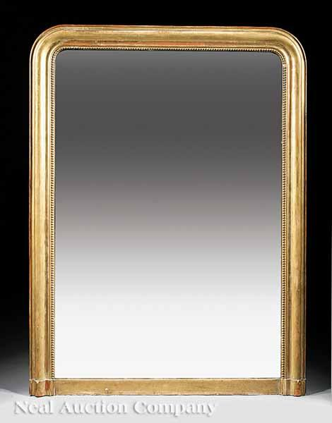 A Louis Philippe Carved and Giltwood Mirror mid 19th c