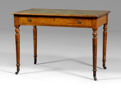 Regency style oak writing table green leather top over dovetailed