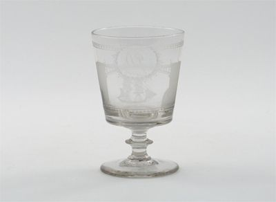A glass rummer the bucket shaped bowl engraved with a